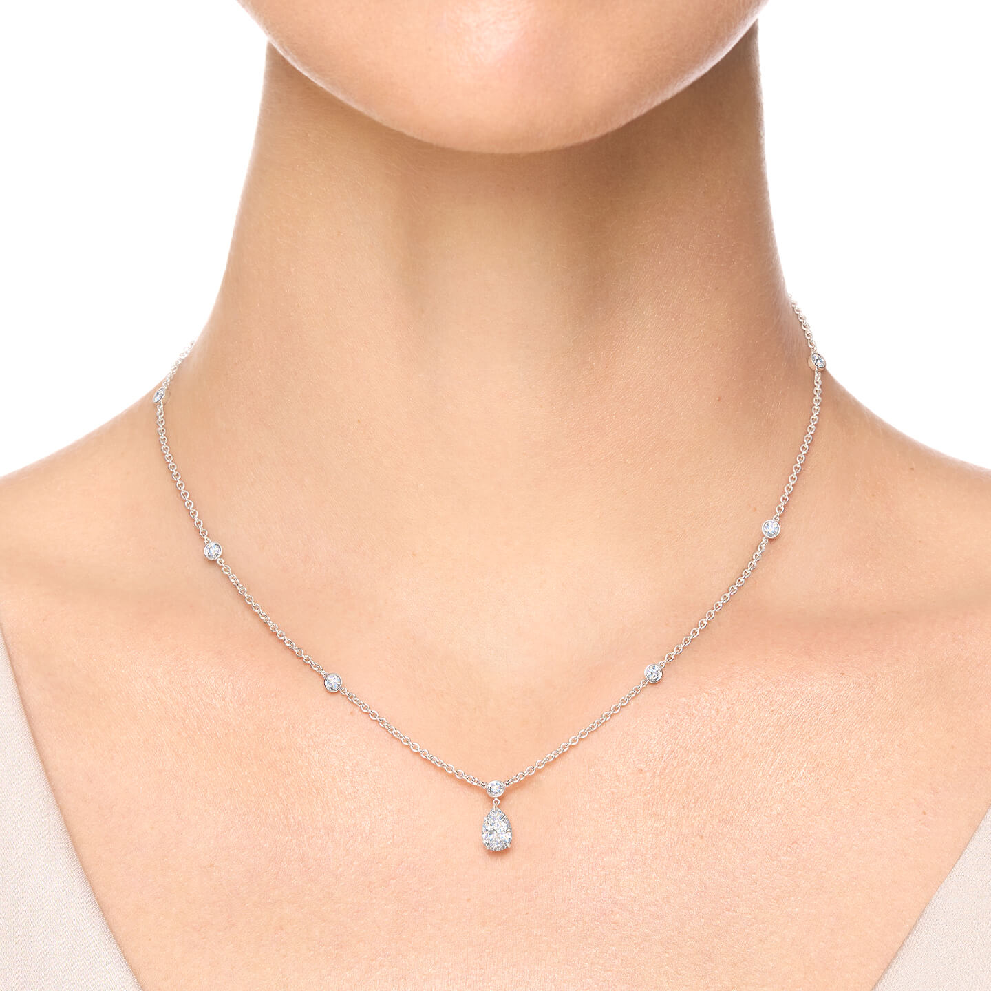 Pear-Shaped Diamond Pendant on a Rondelle Chain on a model