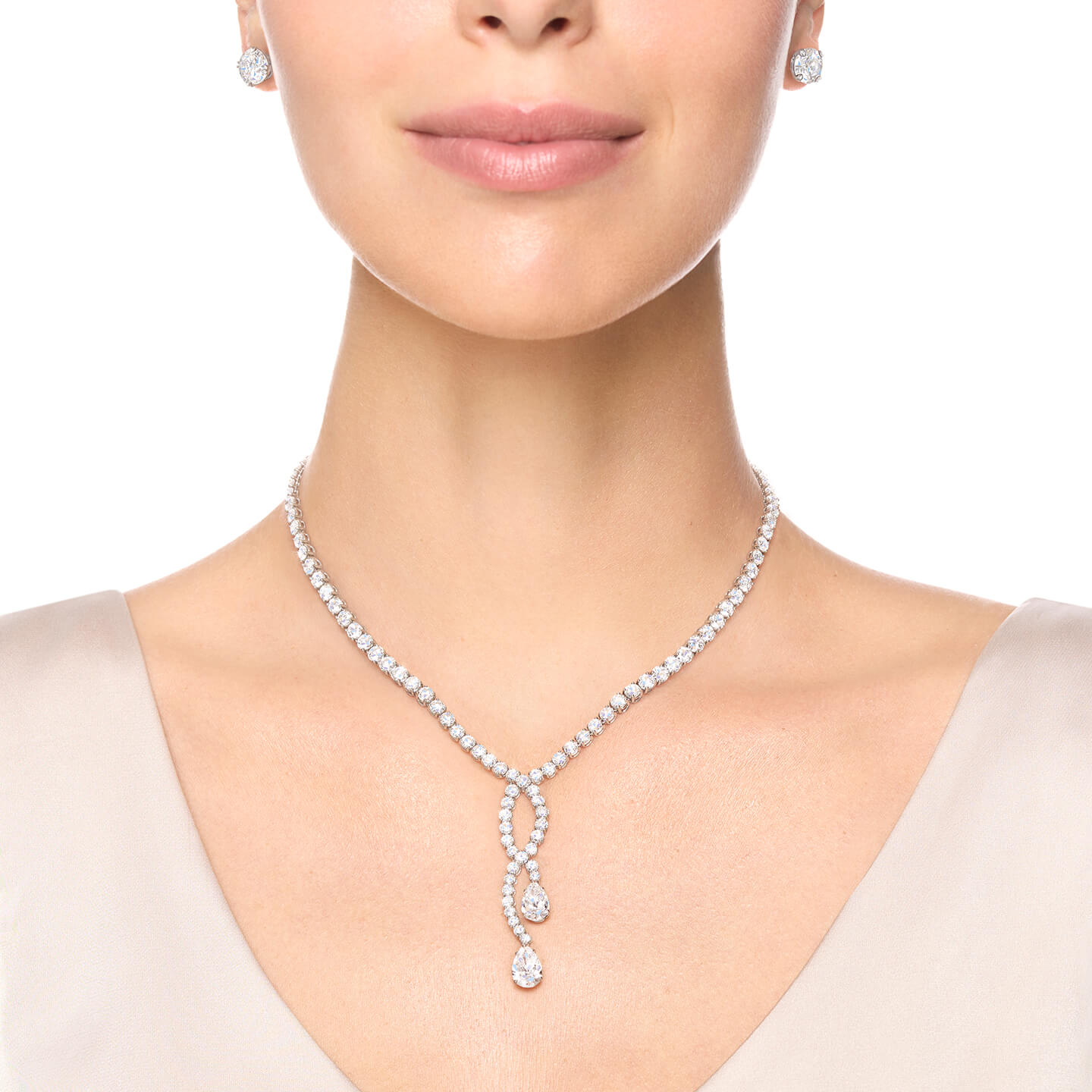 Round Brilliant and Pear-Shaped Cascading Diamond Necklace on a model