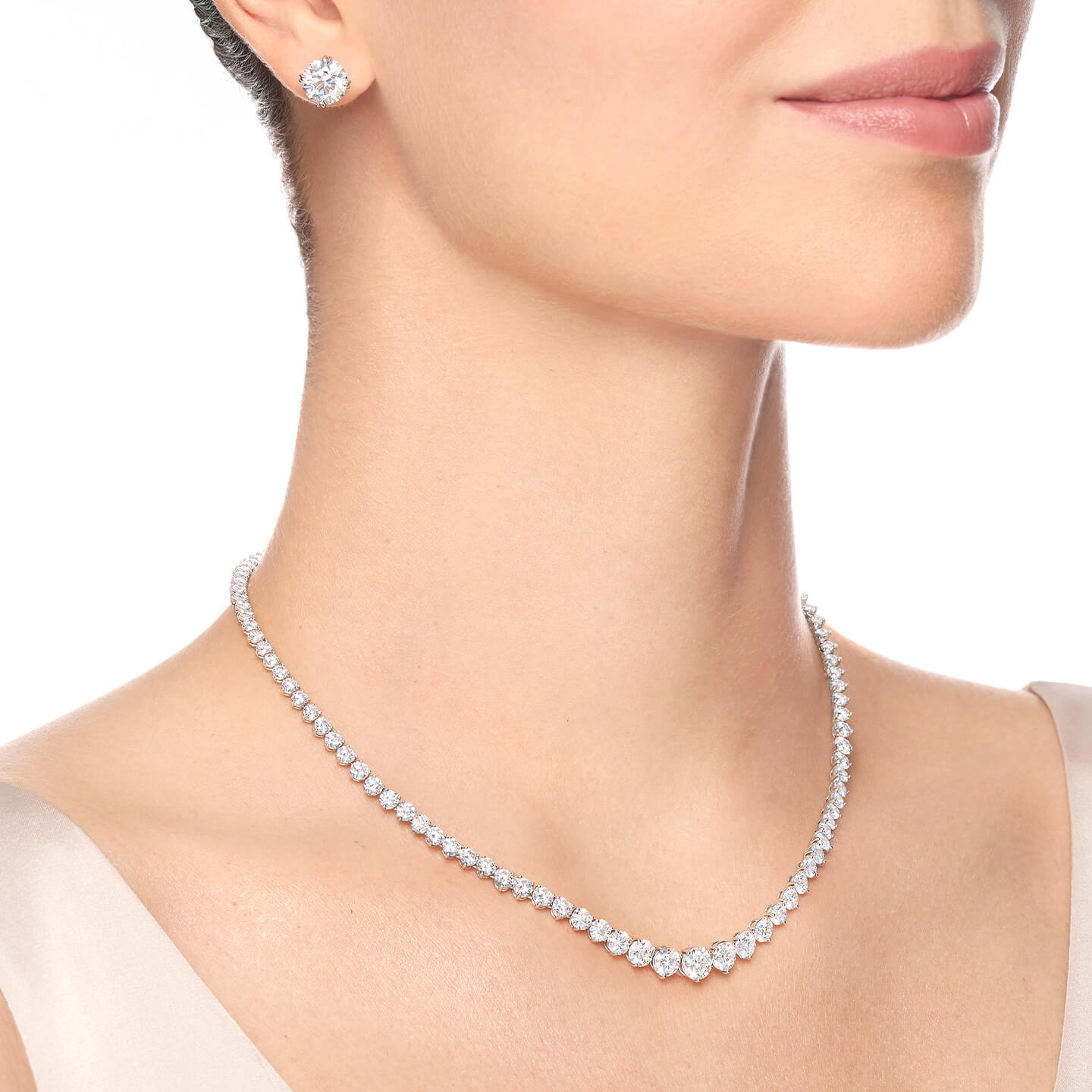 Round Brilliant Riviere Diamond Necklace on a model angled