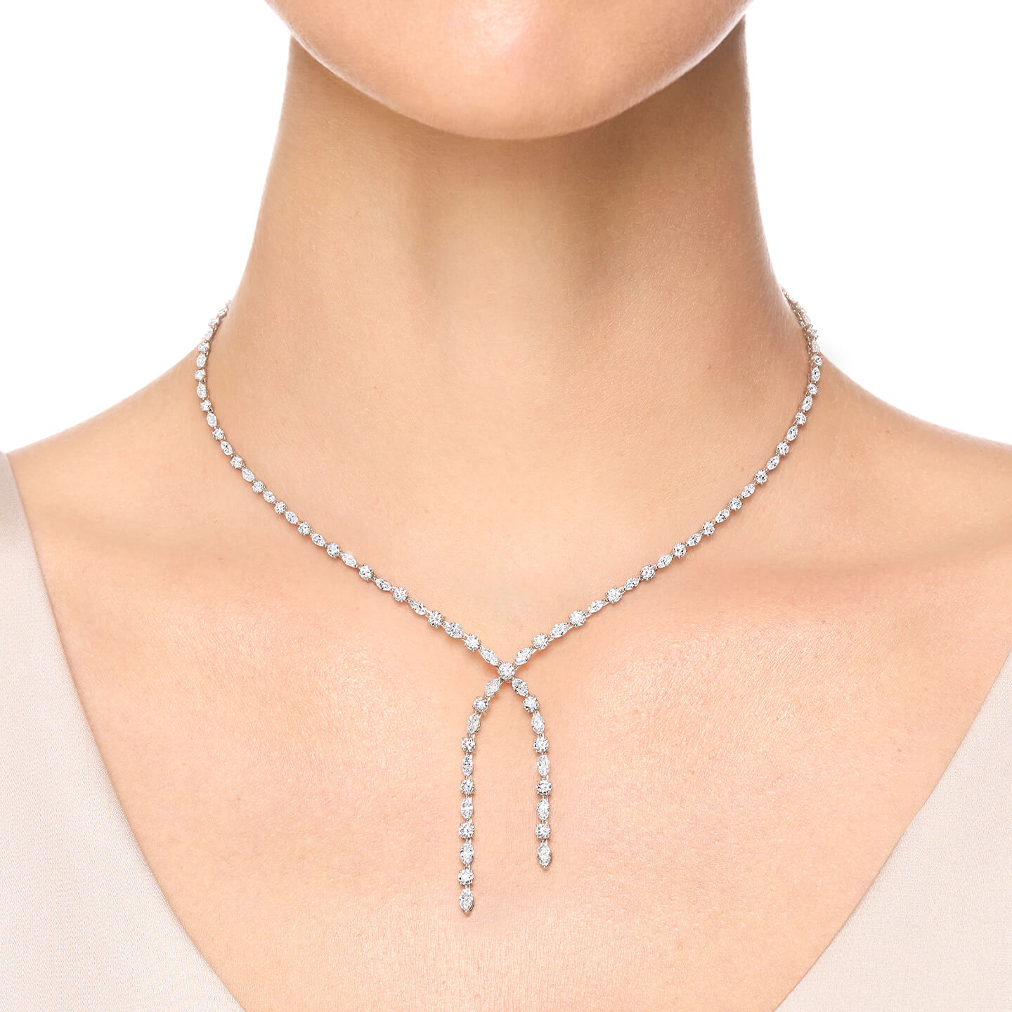 Small Round Brilliant and Marquise Lariat Diamond Necklace on a model