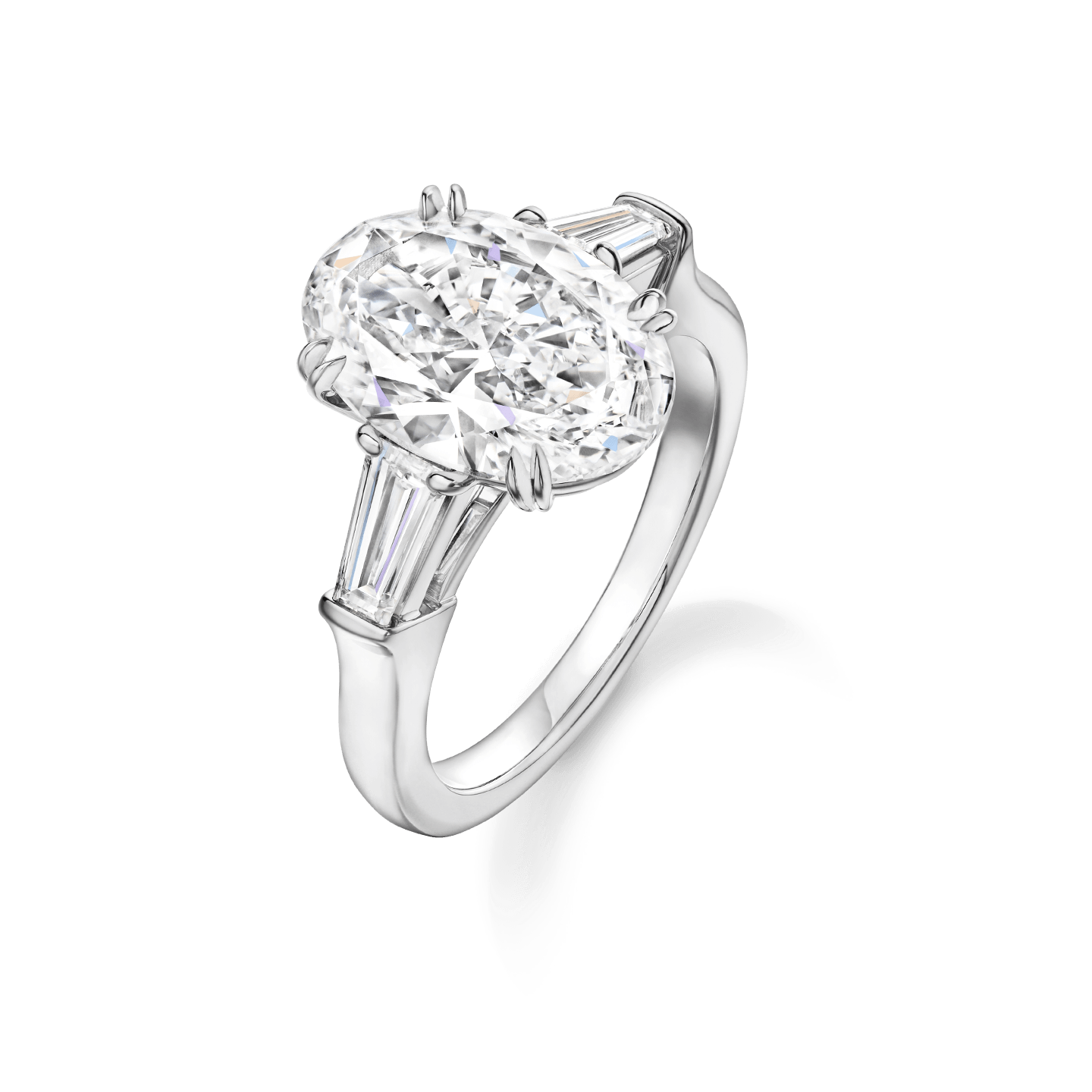 Angled view of the Classic Winston Oval-Shaped Engagement Ring with Tapered Baguette Side Stones